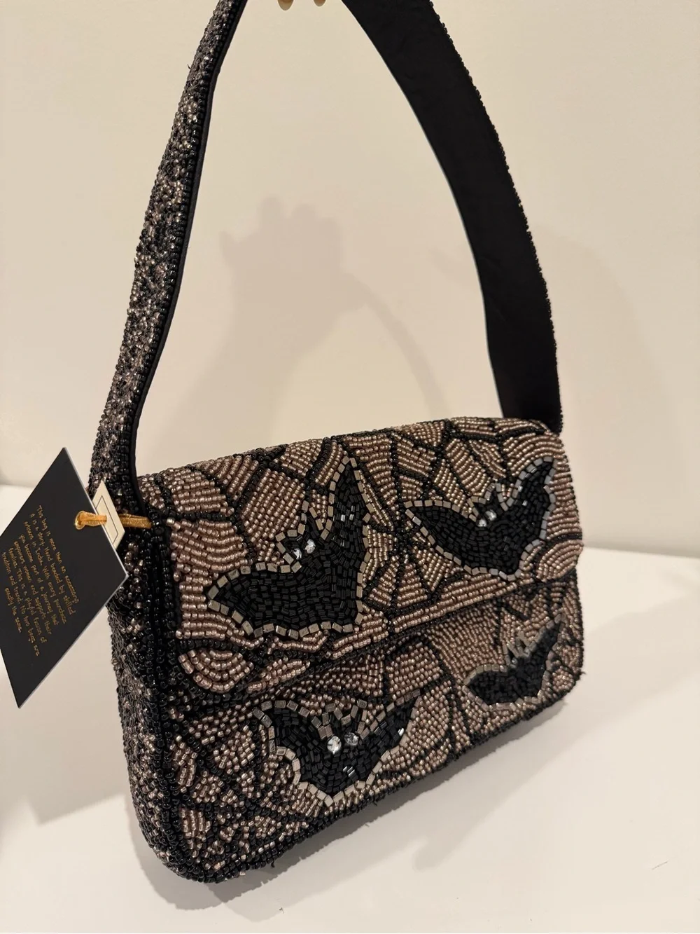 Beaded Bat Motif Shoulder Bag in Black and Champagne
